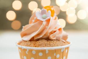 Tasty cupcake with butter cream photo