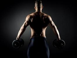 Muscular man weightlifting