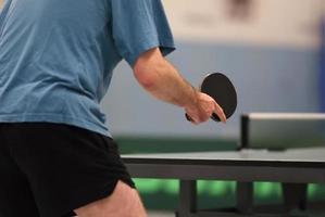 table tennis player waiting for the ball photo