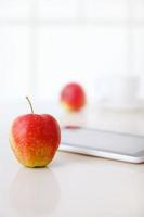 apple with tablet PC