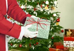 santa claus with gift photo