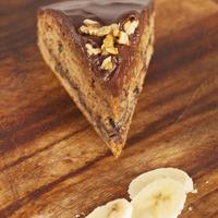 piece of chocolate cake with banana and nuts cake