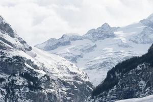 Snow Capped Mountain in Swiss Alps photo