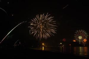 beautiful fireworks celebrating new year on the beach
