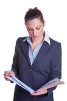 Businesswoman reading a file photo