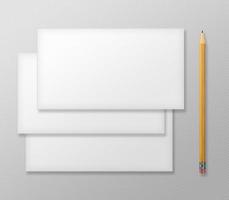 Set of Blank Envelopes with Yellow Pencil on Gray Background.