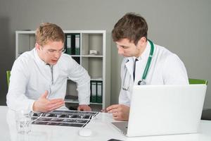 two doctors talking photo