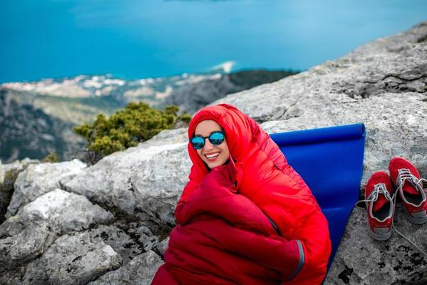 Woman in sleeping bag on the mountain 794828 Stock Photo at Vecteezy