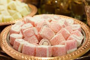 Variety of turkish delight and dried fruit photo