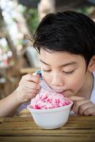 Little asian child with ice cream photo