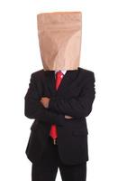 Man with a paper bag on head photo