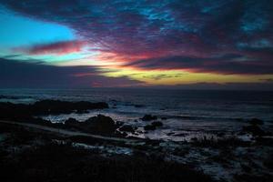 puesta de sol del océano pacífico foto