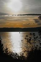 sailing at sunset photo