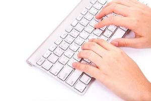 female hands typing on a keyboard text photo