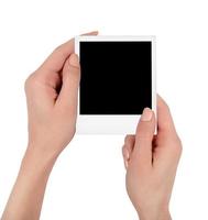 Instant photo in female hand