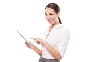 Woman pointing at digital tablet