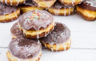 Stack of donuts with color glaze. photo