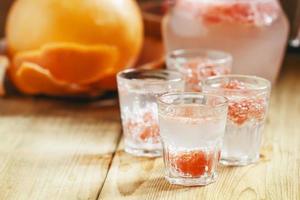 Soda with pink grapefruit in glasses