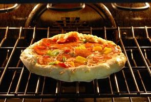 Baking pizza photo