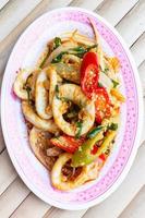 Fried squid in yellow curry powder. photo