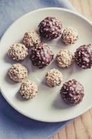 Chocolate Balls on the table photo