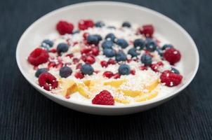 Yoghurt with fresh berries and amaranth photo