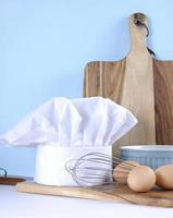 Modern kitchen cooking kitchenware and chef's hat photo