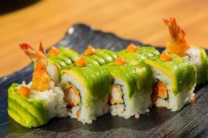 Organic sushi roll with  shrimp tempura at restaurant