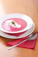 Farmer soup, cream and red beets photo