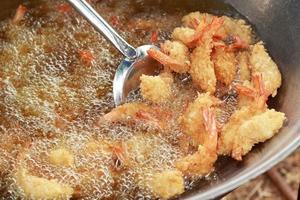 Japanese Cuisine - Tempura Shrimps fried in a pan.