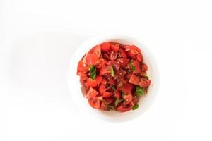 Smal bowl with tomatoes and basil