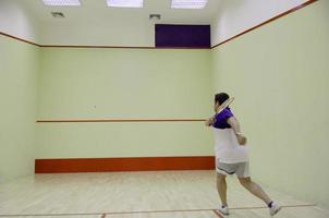 Man playing squash photo