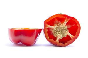 Half sliced red bell chili pepper with seed photo