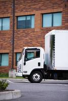 Small class engine semi truck delivery vehicle cargo transportation photo