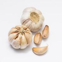 Garlic isolated on white background, selective focus photo
