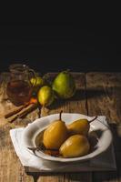 Pears glazed in tea and cinnamon photo
