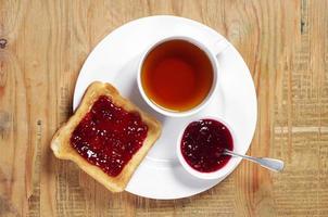 Tea and toast with jam