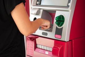 pressing ATM machine photo