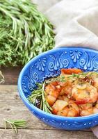 shrimps with tomato and garlic sauce photo
