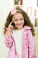 cute little girl using cell phone