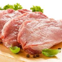 Fresh raw pork on cutting board photo
