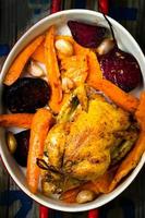 The chicken baked with root crops.