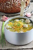 Vegetables soup with meatballs photo