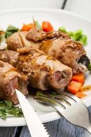 Beef rolls and vegetables photo