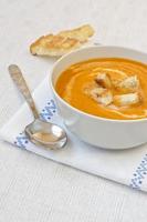 Pumpkin soup with croutons. photo