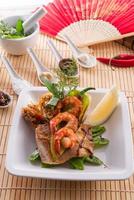 shrimps with fish and vegetables photo