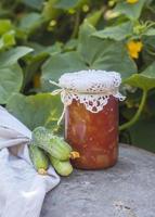 Canning  at home, jar with pickled vegetables. photo