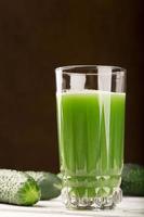 Glass of cucumber juice photo