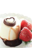 homemade pudding with heart shape chocolate photo