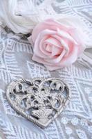 Metal flower heart romantic decorated on chiffon fabric photo